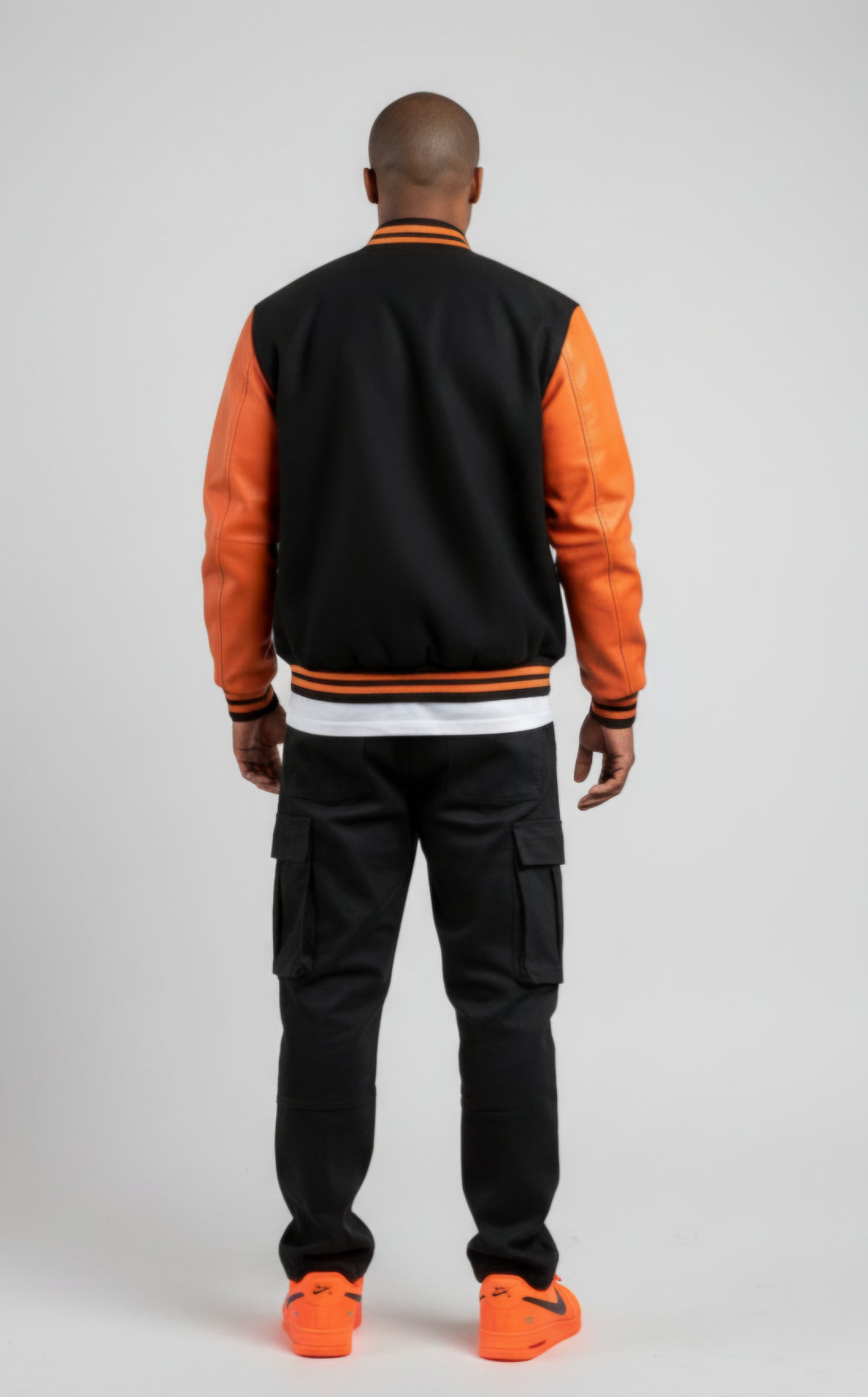 RUNIQUE Heritage Varsity Jacket | Black & Orange
